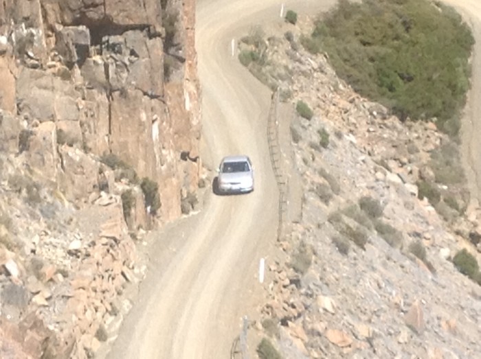 Our car driving slowly up with not much fence between us and the drop.