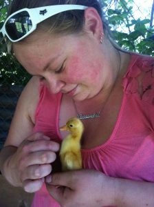 Cassandra enjoys the little yellow duckling... Angel